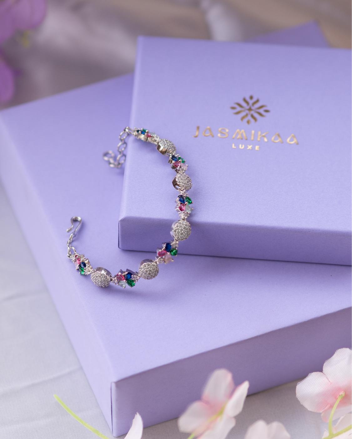 Elegant AD Bracelet with Floral & Circular Stone Design